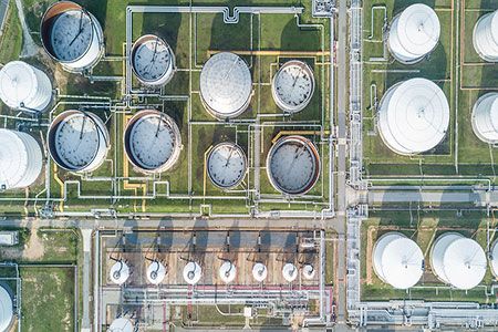 Oil largely unchanged as traders brace for OPEC+ negotiations